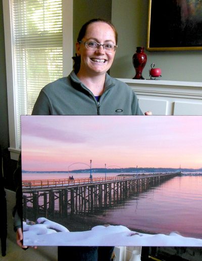 photo of Cheryl with canvas print of photo