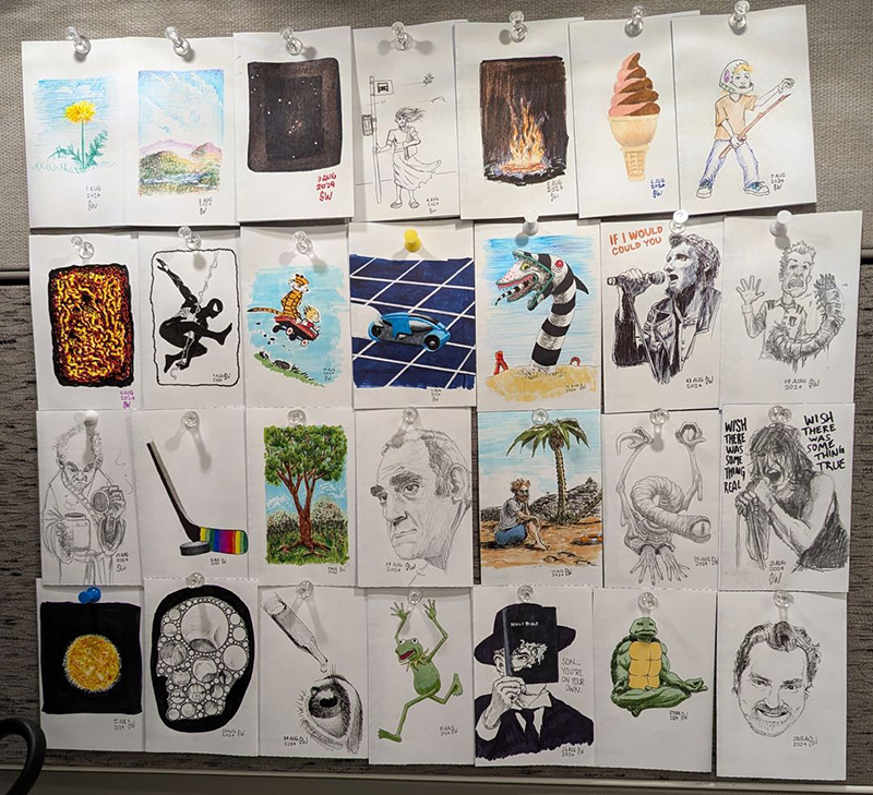 photo of small hand-drawn artworks